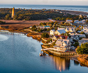 Aerial view of Bald Head Island with lighthouse